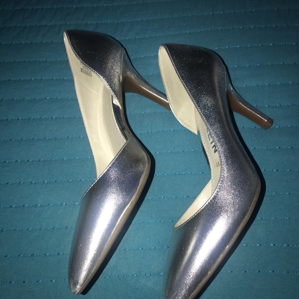 Silver pointy heels